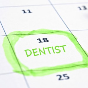 Calendar with the date of a dentist appointment circled