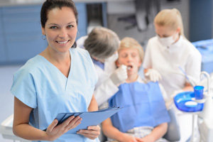 Smiling dental assistant